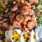 baby shrimp salad with boiled eggs, green onions, and herbs