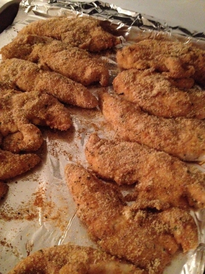 chicken breaded without flour getting ready to be baked