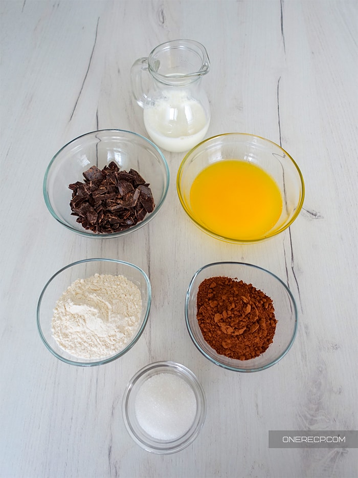 ingredients for the fudgy brownie mix without eggs sorted in cups