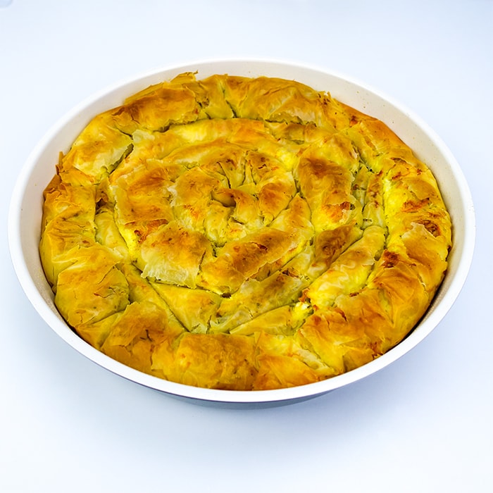 authentic bulgarian banitsa in a white round pan