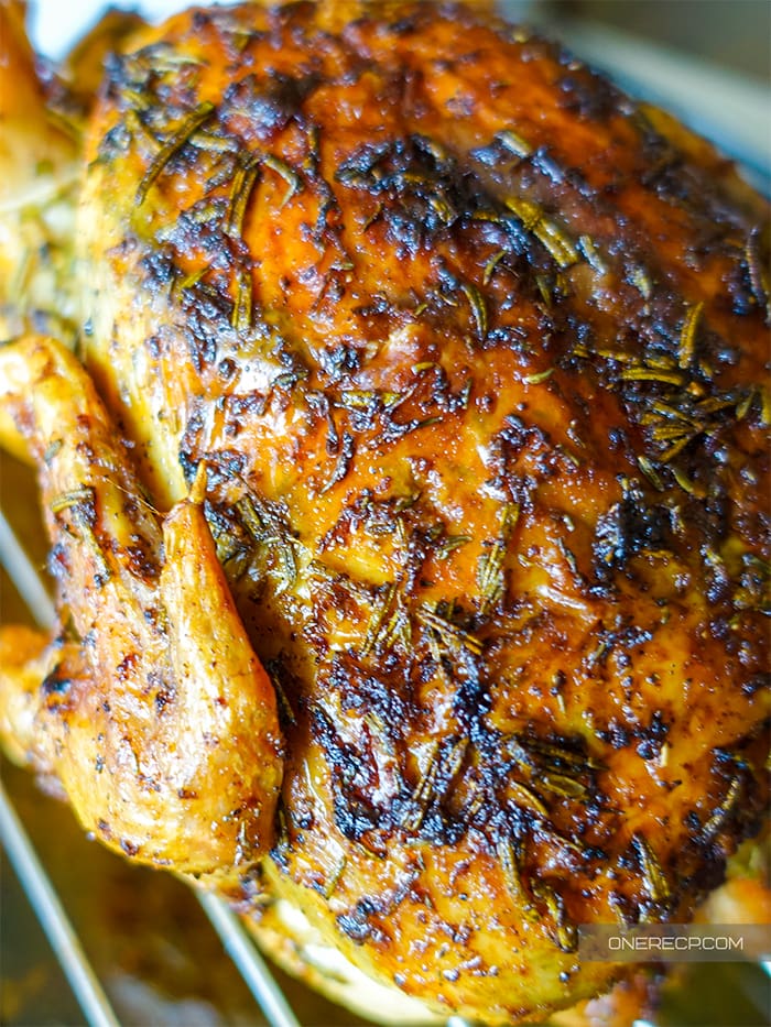 Close-up of a crispy skin of a whole convection roasted chicken