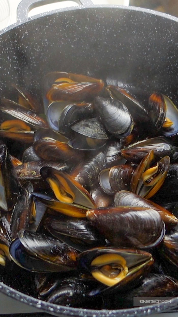 Cooked mussels with opened shells immediately after cooking