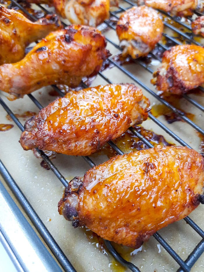 crispy oven baked chicken wings on a baking rack