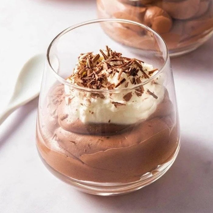 A glass of chocolate mousse