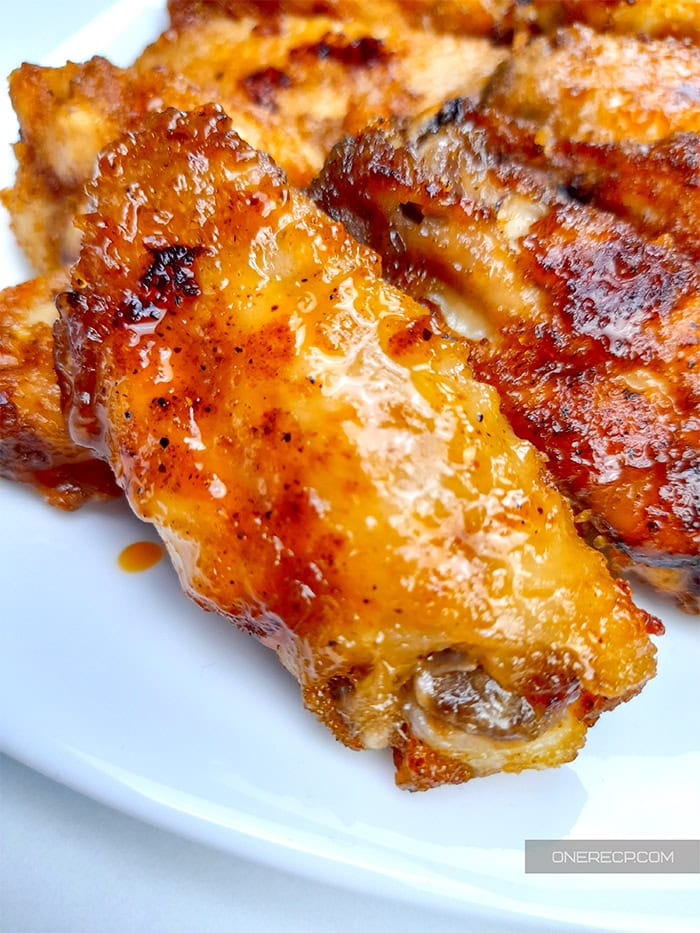 Close-up of a serving of honey chicken wings