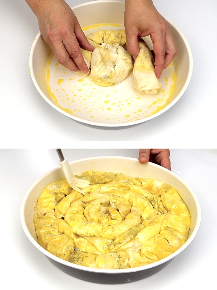 Placing banitsa in a round baking pan and brushing it with egg wash