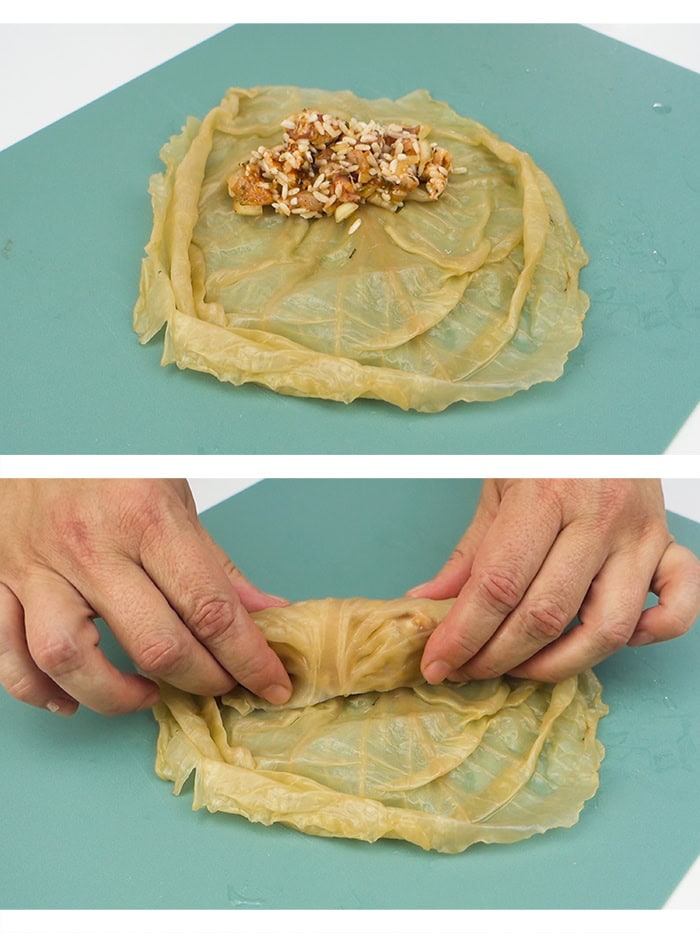 Spreading sarma filling over a sauerkraut leaf and rolling the sauerkraut leaf into a log