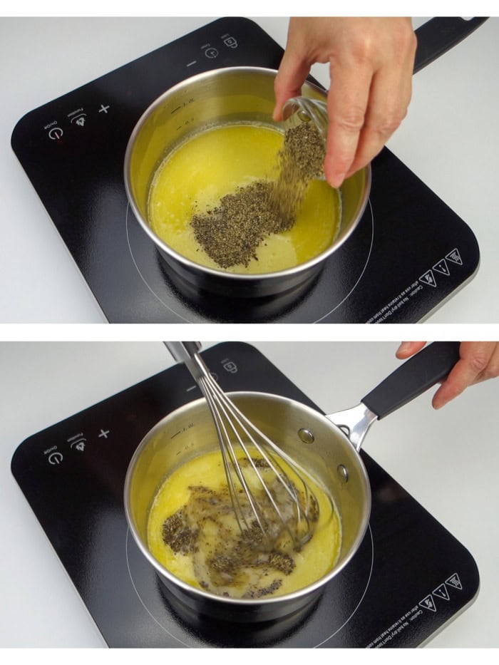 Seasoning melted butter with black pepper and stirring it with a wire whisk