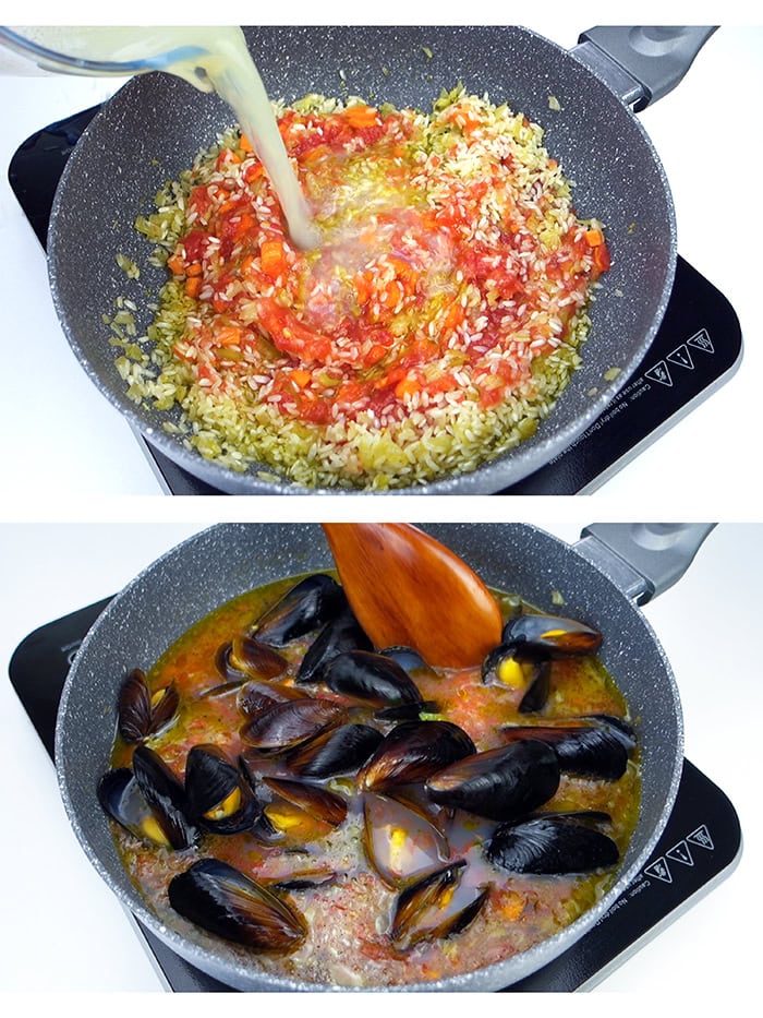 A pot of rice with red peppers and carrots next to a pot with rice, vegetables and mussels.