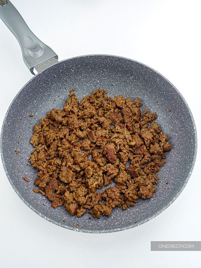 A pan with fully cooked ground beef