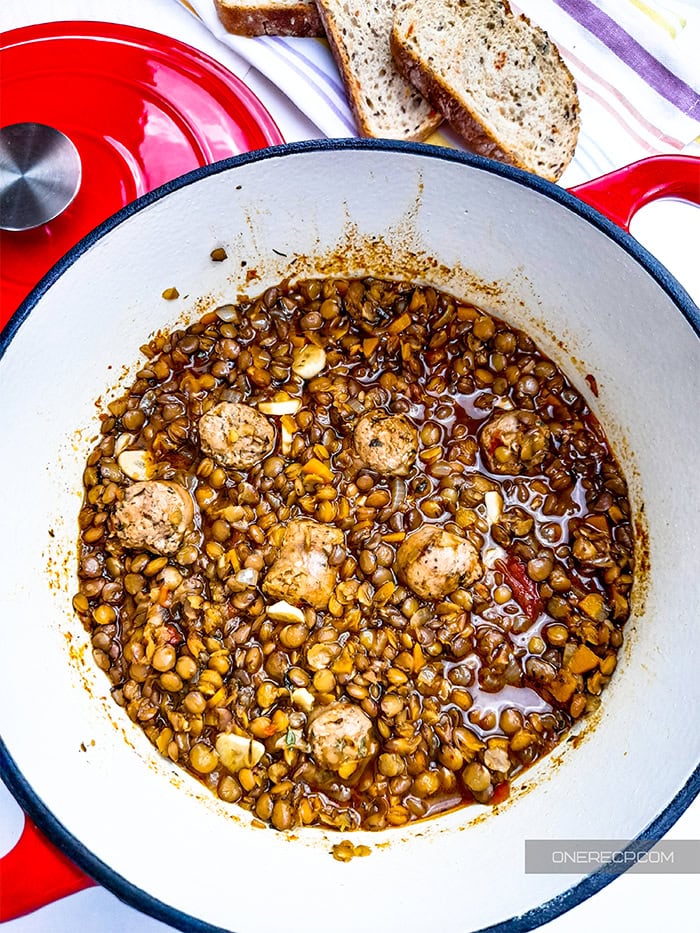 A pot with lentils and sausage