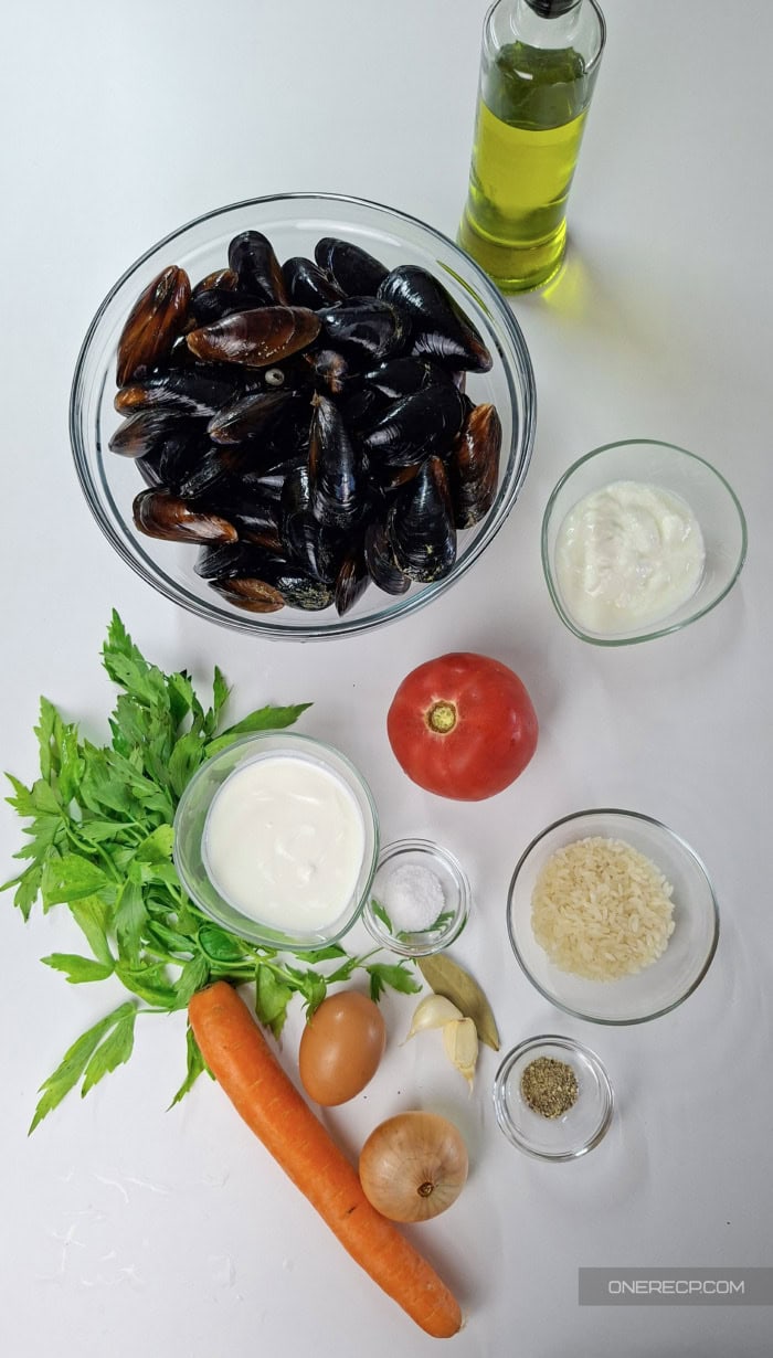 Fresh mussels, vegetables, lovage, yogurt, cream, rice, and seasonings for mussel soup