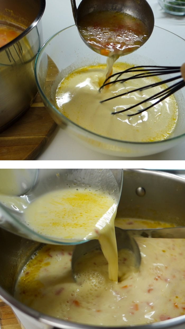 Whisking hot soup into the yogurt mixture, then pouring the tempered mixture into the pot