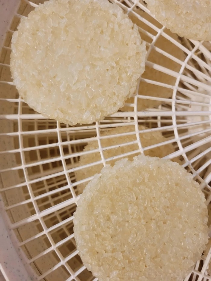 plain rice crackers on a tray 