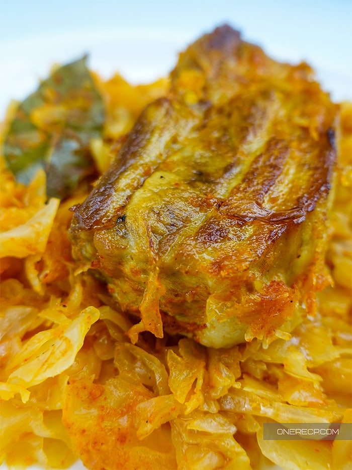 Close-up of a plate with pork and sauerkraut