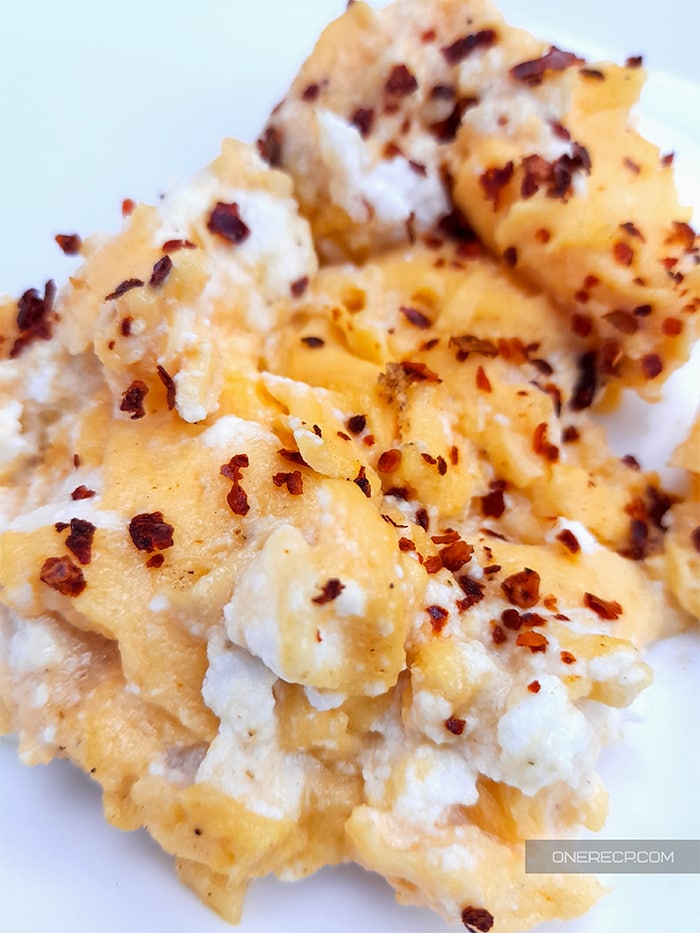 Close-up of scrambled eggs with ricotta