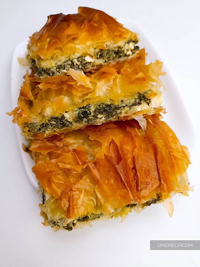 A serving of 4 pieces of spanakopita