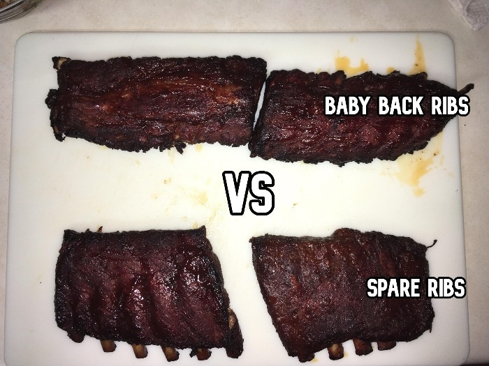 a rack of smoked baby back pork ribs compared to a rack of smoked spare pork ribs side by side so the diffenrece in size, shape and meat content can be seen