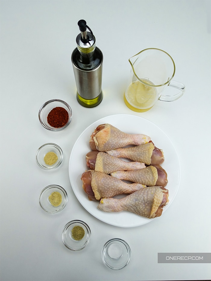all the ingredients for chicken drumsticks made on a stove top 
