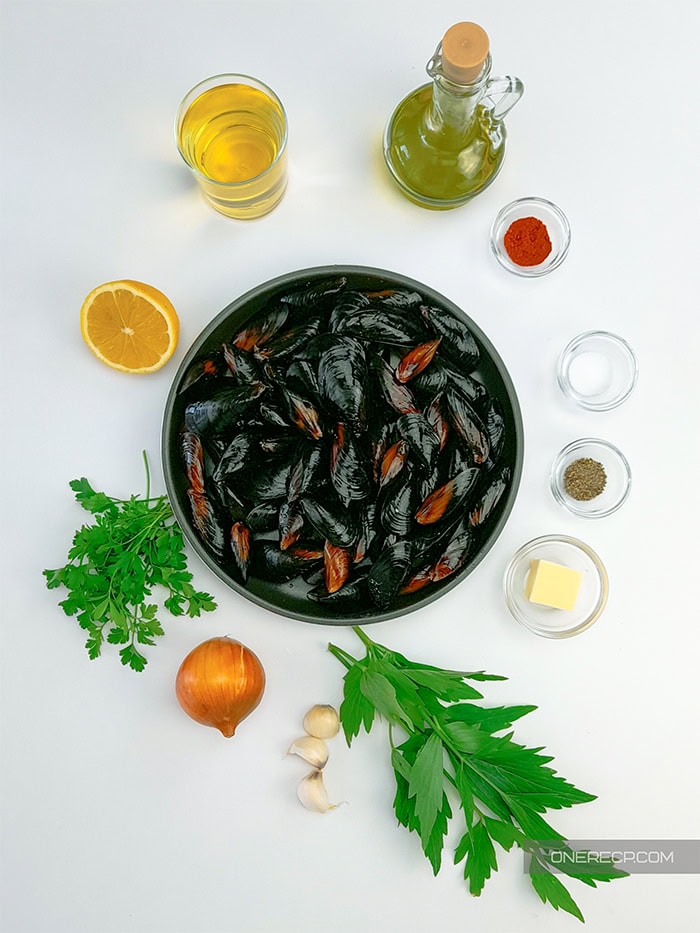 Ingredients for mussels with white garlic butter wine sauce.